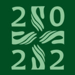 Diakonian juhlavuoden logo, jossa on käsistä muodostuva risti sekä vuosiluku 2022. Logo on vihreä.